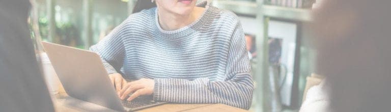 woman on laptop buying au tradelines